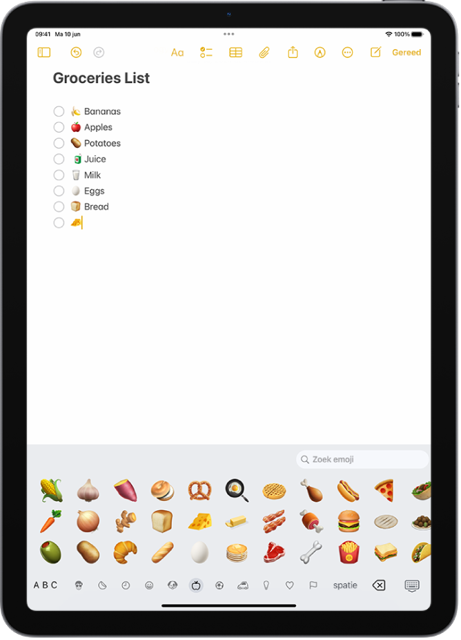 Boven in het scherm is een notitie geopend in de Notities-app. Onder in het scherm is het emoji-toetsenbord geopend.